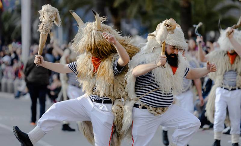 men dressed in costumes perform the traditional Montenegrin circle "Oro"