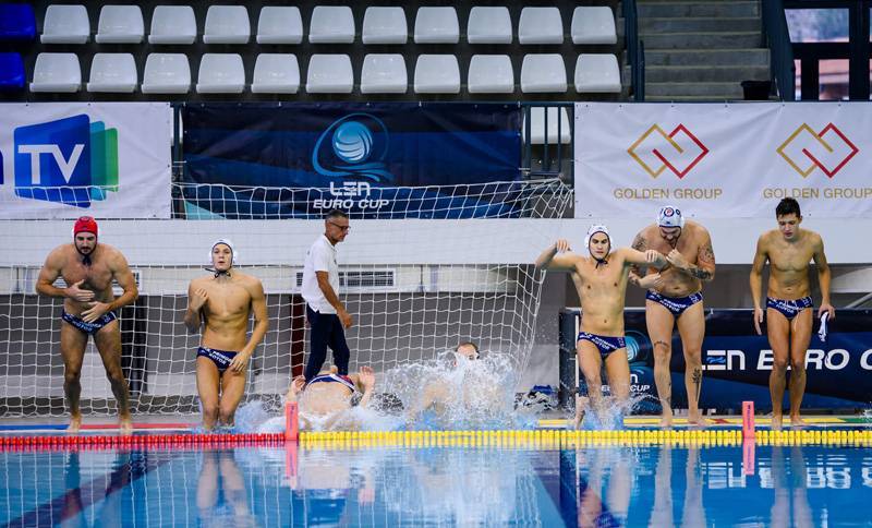 Players of the Primorac water polo club entering the water