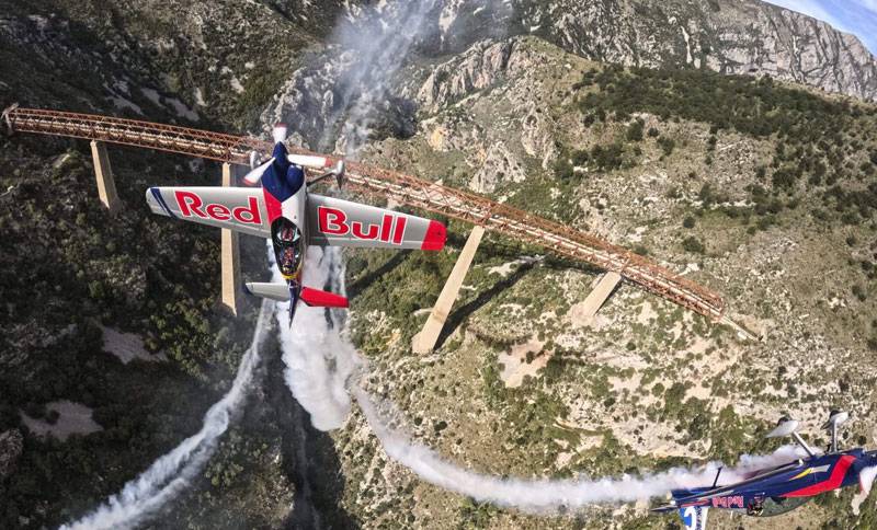 Red Bull pilots flying under the highest railway bridge in Europe in Mala Rijeka in Montenegro