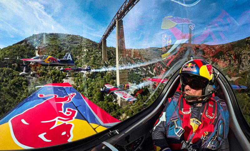 Red Bull pilots flying under the highest railway bridge in Europe in Mala Rijeka in Montenegro